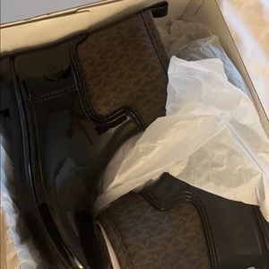 Michael Kors rain boot look, with a leather MK imprint top.Brand new .